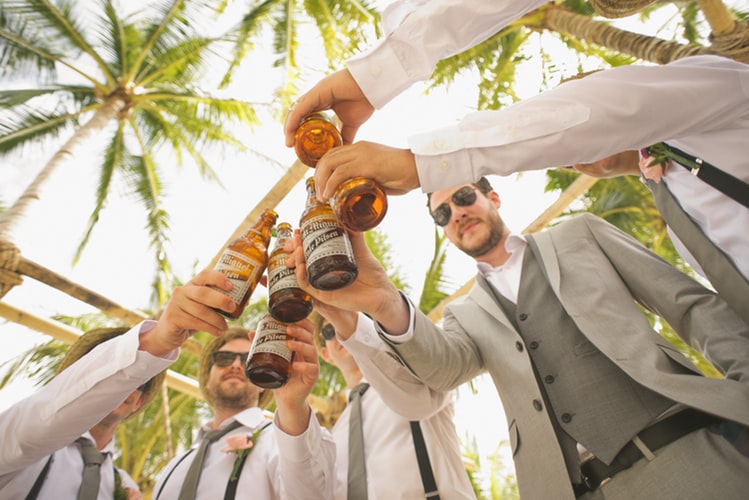 this image shows groomsmen involving how to plan a bachelor's party effectively